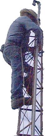 Bruce Rozell climbing a radio tower at age 80.
